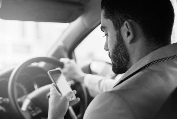 Driver using mobile phone while driving