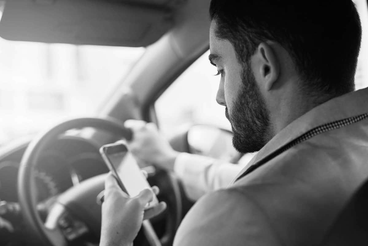 Driver using mobile phone while driving